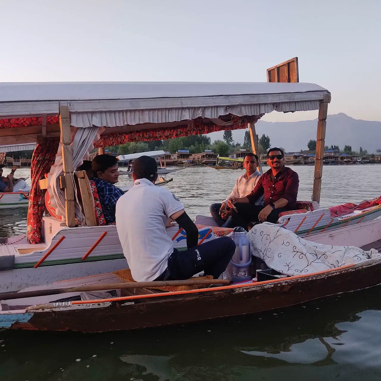 Travellers enjoying a shikara boat ride