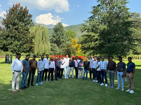 A tour group in a garden